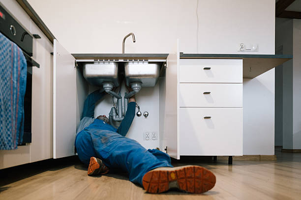 Professional Drain Cleaning technician working in Woodbine, IA